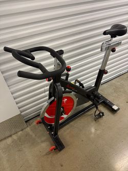 Sunny Health & Fitness Indoor Cycling Bike – Spin Bike, Heavy Flywheel