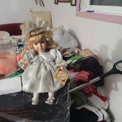 Beautiful  Wind up music playing porcelain Doll.