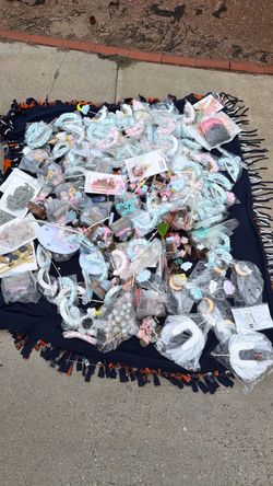 A bunch of cake, decorating toppers, and stuff