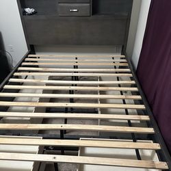 Solid Signature Design by Ashley Caitbrook Queen Storage Bed