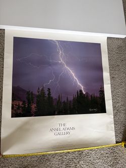 This is an official Ansel Adams Gallery poster titled “Half Dome Lightning”, Yosemite National Park. It captures a dramatic lightning storm with brigh