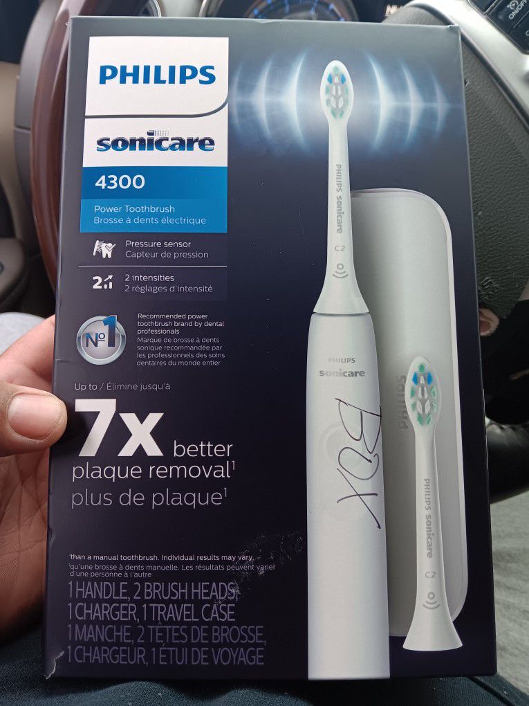 Philips Sonicare 4300 Power Toothbrush, Rechargeable Adult Electric Toothbrush with Pressure Sensor,

