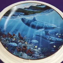 Danbury Mint collector plate titled "Lahaina Seaflight" from the "Underwater Paradise" collection, featuring artwork by Robert Lyn Nelson. J5L032