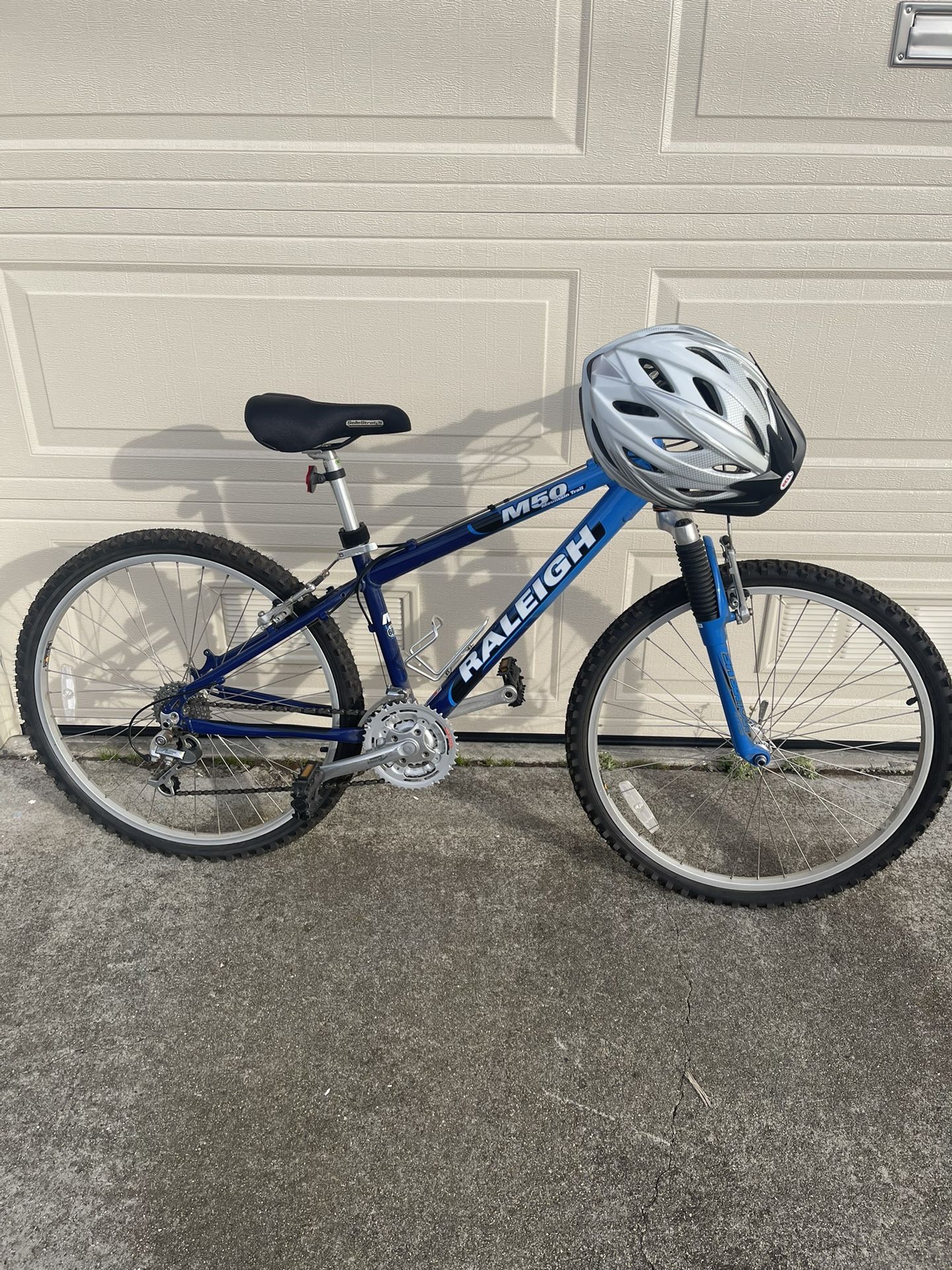 2000s Blue mountain bike Raleigh And Helmet Not Included