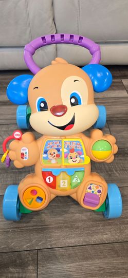 This is a Fisher-Price Laugh & Learn Smart Stages Learn with Puppy Walker in beige and blue