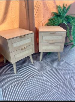 New two-drawer bedside tables are in their original boxes