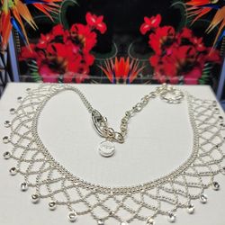 $2138, GIVENCHY LACE PATTERN CLEAR SWAROVSKI CRYSTAL 17"IN
