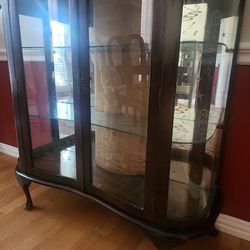Antique Cabinet With Rounded Glass Edges