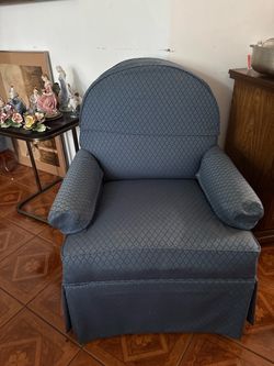 Blue Upholstered Armchair with Skirted Base