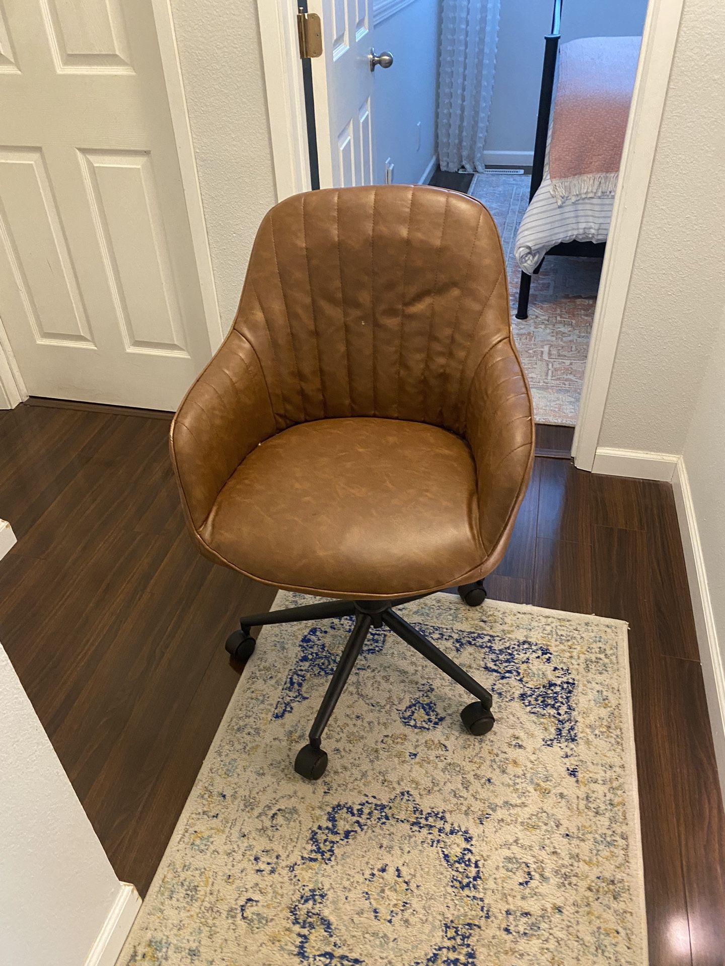 Brown Rolling And Adjustable Office Chair