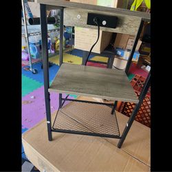 End shelf with charging ports