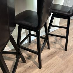 3 Brown Leather Swivel Barstools 