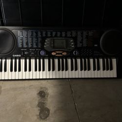 Casio keyboard and stand -no cord