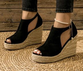 Woman’s Espadrille Peep Toe Wedge