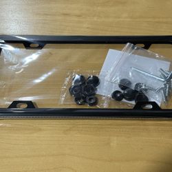Brand New Sealed  2 pcs License Plates Covers. Stainless Steel with accessories.