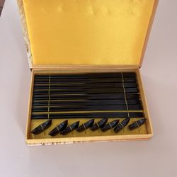 EIGHT CHINESE LACQUERED CHOPSTICKS AND RESTS