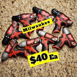 Milwaukee  M12 Battery And Impact Drill 