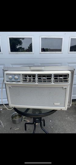 12000 Btu Air conditioner Works great has side flaps. 165