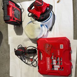 Bundled tools. 105 piece socket set, 10 inch buffer, portable battery, power sander