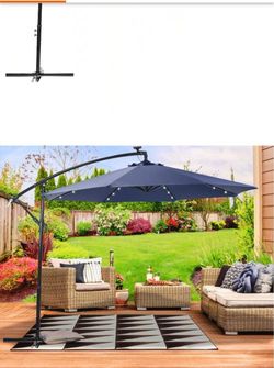 Umbrella comes with stand offer
