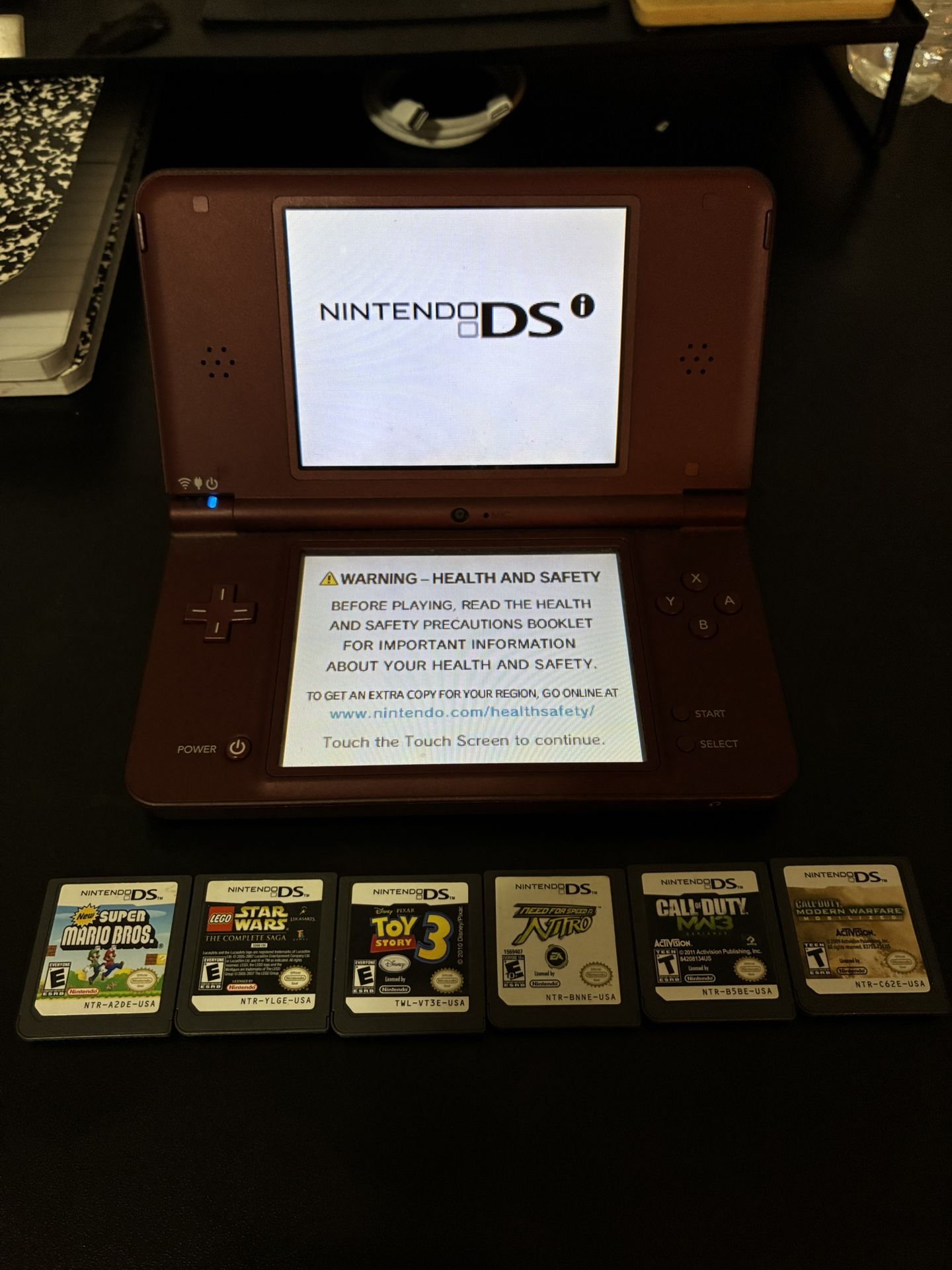 Nintendo DSI XL + 6 Games