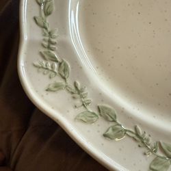 Vintage porcelain plates, pitcher, creamer, and sugar dish from Manor House