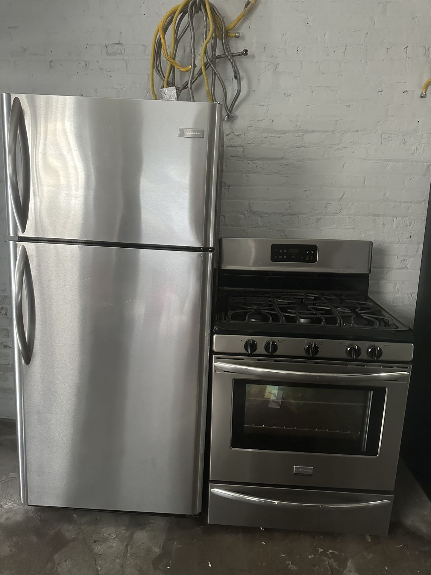 Frigidaire Top freezer refrigerator &. Frigidaire 5 burner gas range set stainless steel