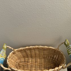 wicker basket with ceramic fish