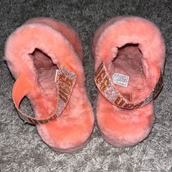 Peach furry UGG slippers