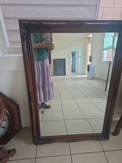 Brown old style mirror