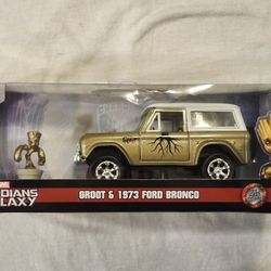 JADA METAL DIECAST CAR 1:32 SCALE.  MARVEL GUARDIANS OF THE GALAXY GROOT.  1973 FORD BRONCO AND GROOT METAL DIECAST FIGURE. 