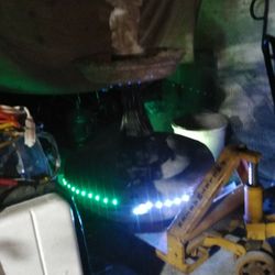 Boy And Girl Under Umbrella Fountain