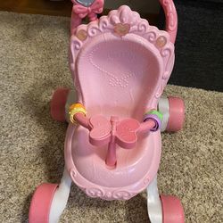 Baby Walker And A Stroller For A Doll
