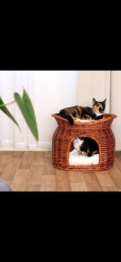 BingoPaw 2-tier wicker pet bed featuring a cave-like condo on the bottom and a top lounging deck