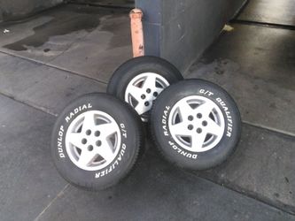 Three stock 1995 Jeep Grand Cherokee Wheels