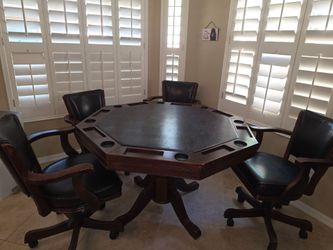 Game Table with Reversible Top and 4 Rolling Chairs