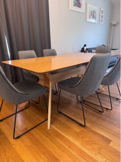 Wooden dinning table and 6 fabric chairs