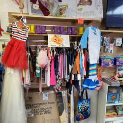 Little girls dresses $5 baby baptismal outfits $5 Water boots $3 swimsuits $5
