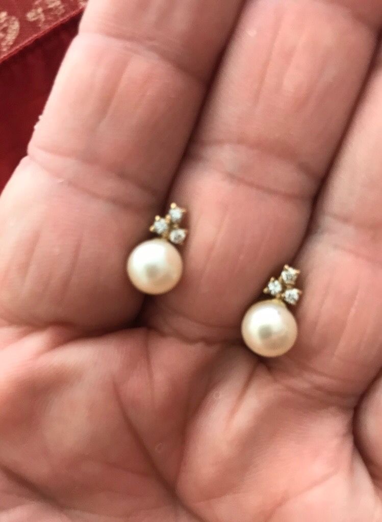 New. 14k yellow gold pearl and diamond earrings. Pearls are natural and diamonds real. Solid gold. Great gift for the woman in your life for Chri