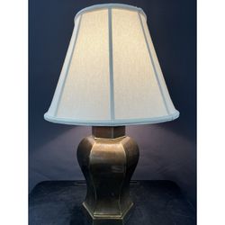 Brass tone Hollywood Regency brass urn table lamp. Shade needs some spot cleaning