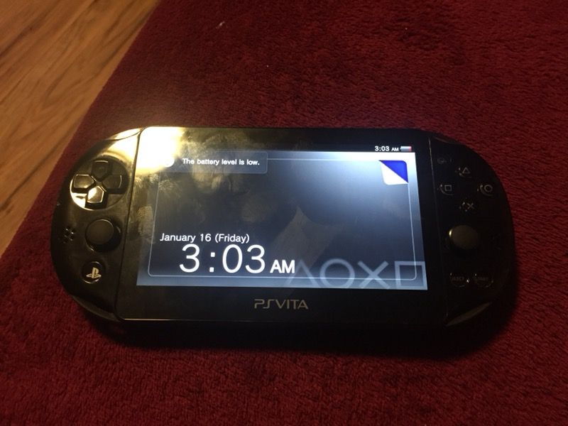 PS Vita Slim with 32GB + 16GB Memory no games with Charger for