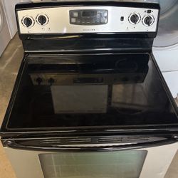 Glass tub Electric Stove ask in a condition Admiral by Maytag