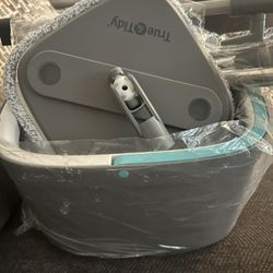 New True & Tidy spin mop and bucket system.