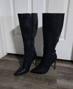 Black high heel boots size 8