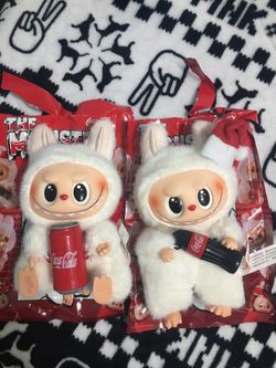 2 of Coca cola labubu NEW. It has some factory defects but not obvious