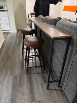 2 Brown leather barstools