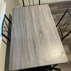 Used Kealani Dining Set with 4 Upholestered Metal Chairs