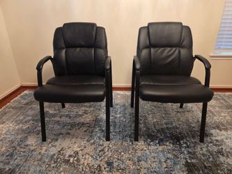 Two Black Executive Chairs