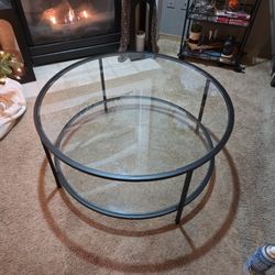 Like New RoundGlass And Metal Coffee Table