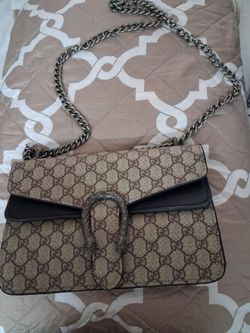 Purse with metal strap